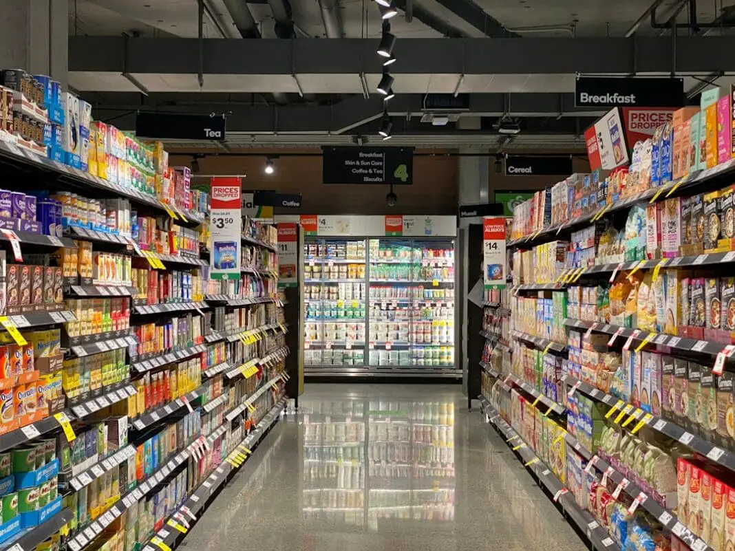 aisle, food, cheese, dairy refrigeration, cookies, biscuit, cereal, tea, coffee, yogurt, almond, rice, soy milk rice, spice, sauce, cereal, quick milk, store shelf shelf, store, supermarket, supermarket aisle