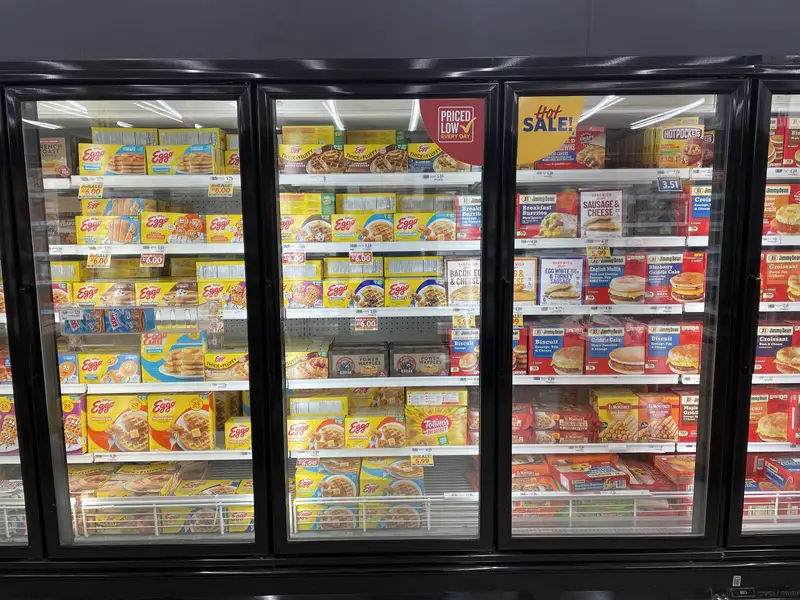 Grocery store interior frozen foods breakfast section