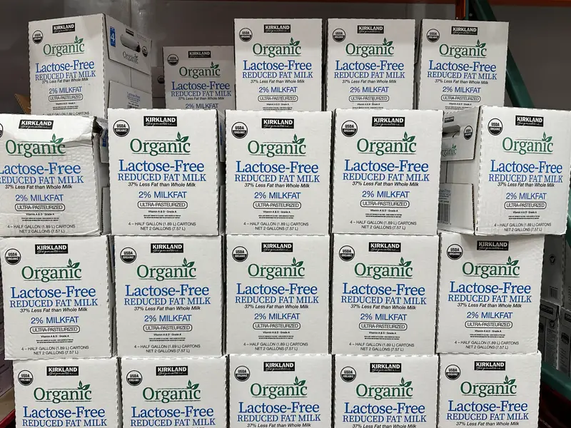 Containers of Organic Lactose-free reduced fat milk