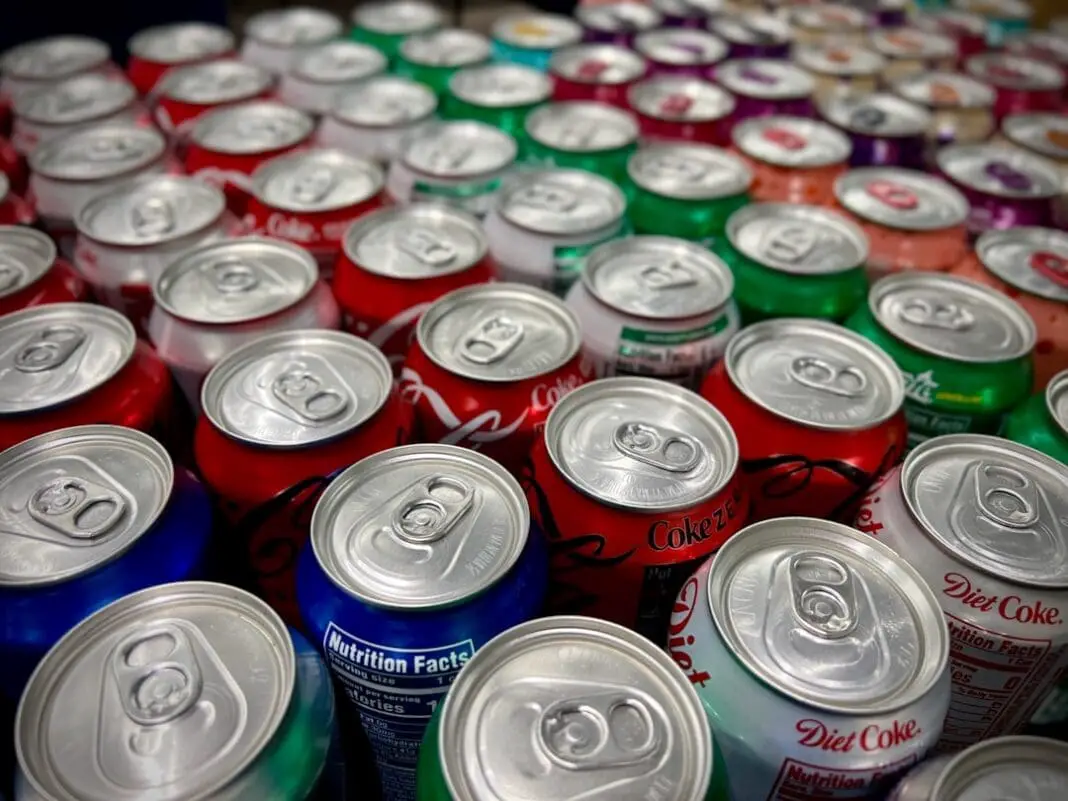 You say soda. I say pop. Stewardess: Can I get you anything to drink? Clark: Honey? I guess I'll have a Coke. Stewardess: Do you want that in the can? Clark: No, I'll have it right here.