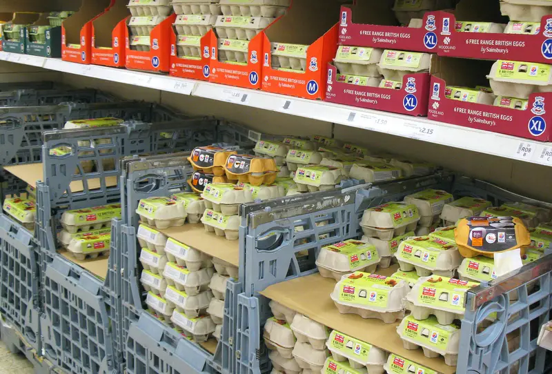Hens eggs for sale on a supermarket shelf.
