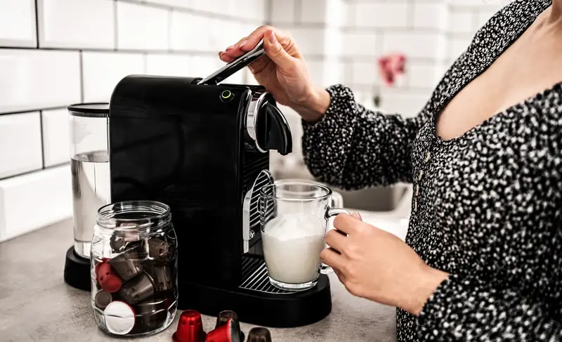 Capsule coffee machine at domestic kitchen